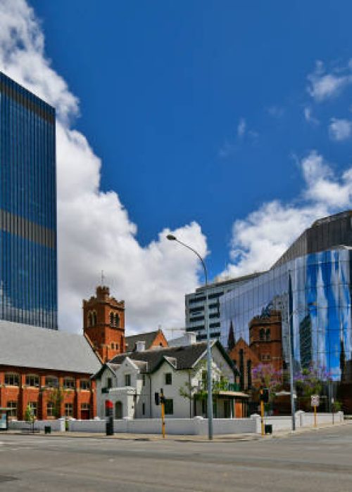 Australia, WA, Perth, different buildings and St. Georges cathedral with reflection in glass facade